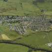 Oblique aerial view of the housing and part of the town, taken from the SW.