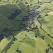 General oblique aerial view centred on the village, taken from the WNW.