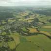 General oblique aerial view centred on the town and village, taken from the WSW.