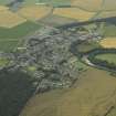 General oblique aerial view centred on the village, taken from the SSE.