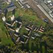 Oblique aerial view centred on the training centre, flats and housing, taken from the SE.