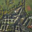 Oblique aerial view centred on the infirmary, taken from the SSW.