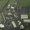 Oblique aerial view of the airport buildings, taken from the S.