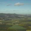 General oblique aerial view wit the remains of the fort in the distance, taken from the S.