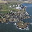 Oblique aerial view of Boddam village, Buchan Ness Lighthouse and Peterhead power station, taken from the SE.