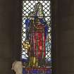 Interior.  Stained glass window depicting Aaron designed by R Anning Bell executed by J & W Guthrie