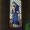 Interior.  Stained glass window depicting the  Widow's son designed by R Anning Bell executed by J & W Guthrie