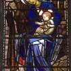 Interior.  Stained glass window depicting the  Virgin and Child designed by R Anning Bell executed by J & W Guthrie