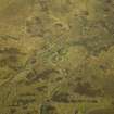 Oblique aerial view centred on the remains of the sheepfolds and field systems, taken from the N.