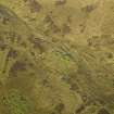 Oblique aerial view centred on the remains of the sheepfolds and field systems, taken from the W.