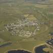 General oblique aerial view centred on the village, taken from the SSE.