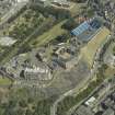 Oblique aerial view centred on Edinburgh Castle with the Military Tattoo stands set up on the esplanade, taken from the SW.