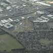 General oblique aerial view centred on the industrial estate and housing estate, take from the NNE.