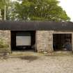 Arched roof cart shed, view from NW