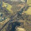 Oblique aerial view centred on the railway viaduct and the remains of the rig, taken from the E.