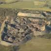 Oblique aerial view centred on the remains of the shale bing, taken from the SSE.