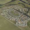 General oblique aerial view centred on the housing estate, taken from the SW.