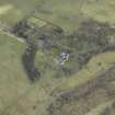 Oblique aerial view centred on country house, taken from the WNW.