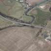 Oblique aerial view centred on the road bridge, taken from the SW.