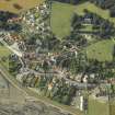 Oblique aerial view centred on the village, taken from the SE.