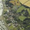 Oblique aerial view centred on the village, taken from the E.