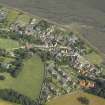 Oblique aerial view centred on the village, taken from the NW.