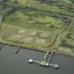 Oblique aerial view of the remains of the shipyard centred on the piers, taken from the S.