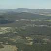 General oblique aerial view looking over Nethy Bridge towards the Hills of Cromdale, taken from the W.