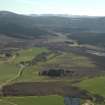 General oblique aerial view looking over the farmhouse and farmsteading towards the Grampian Highlands, taken from the N.