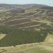 General oblique aerial view over the remains of the field system, taken from the S.