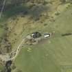 Oblique aerial view centred on the farmsteading, taken from the SE.