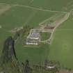 Oblique aerial view centred on the farmstead, taken from the W.