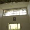 Interior.  Upper window and light fitting in processing room.