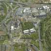 Oblique aerial view centred on the cathedral and hospital, taken from the S.