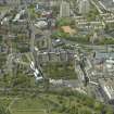 Oblique aerial view centred on the cathedral and hospital, taken from the W.