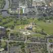 General oblique aerial view of Glasgow Green centred on the museum with the factory adjacent, taken from the NE.