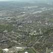 General oblique aerial view of the city looking over the housing, taken from the NE.