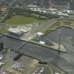 Oblique aerial view centred on the science centre and docks, taken from the N.