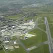 General oblique aerial view centred on the airport, taken from the ENE.