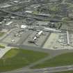 Oblique aerial view of the terminal buildings and apron, taken from the NW.