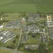 Oblique aerial view of the former hospital, taken from the SW.