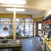 Interior. Ground floor. Front shop (N) to Bristo Street frontage, showing modern shop fittings and display cabinets.