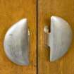 Interior. Ground floor. Main assembly hall door handles. Detail