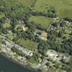 General oblique aerial view centred on the town and country house, from the ESE.