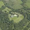 Oblique aerial view centred on the house, taken from the SW.