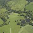 Oblique aerial view centred on the house, taken from the SW.