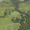 General oblique aerial view centred on the house, taken from the SSW.