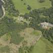 Oblique aerial view centred on the house, taken from the SW.