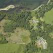 Oblique aerial view centred on the house, taken from the SE.