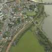 Oblique aerial view.  Kincardine-on-Forth, Station Road, reconstruction works for rebuilding railway from Alloa, railway station and Station House from NW.